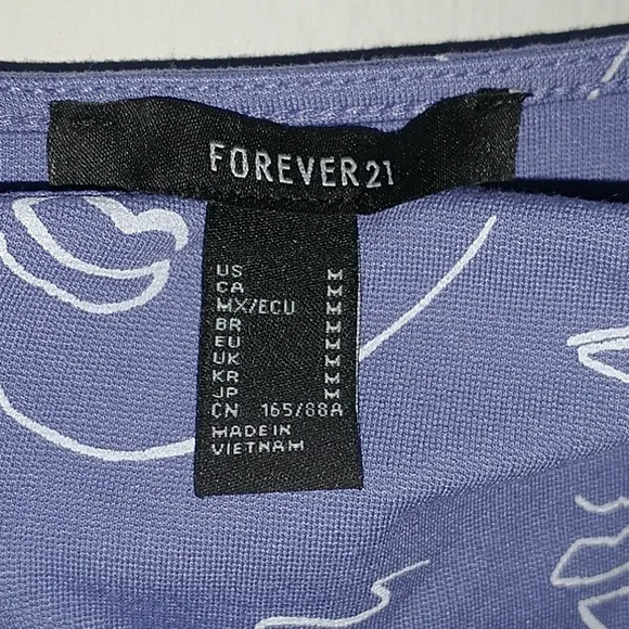 Abstract Face Print Bodysuit_Asymetrical Neck - Picture 10 of 11